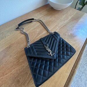 Selling mother’s SL purse lightly used.